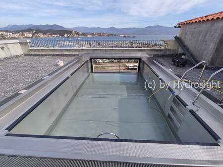 Piscine Inox sur Toit à Ajaccio : Vitrage de Sécurité en Façade